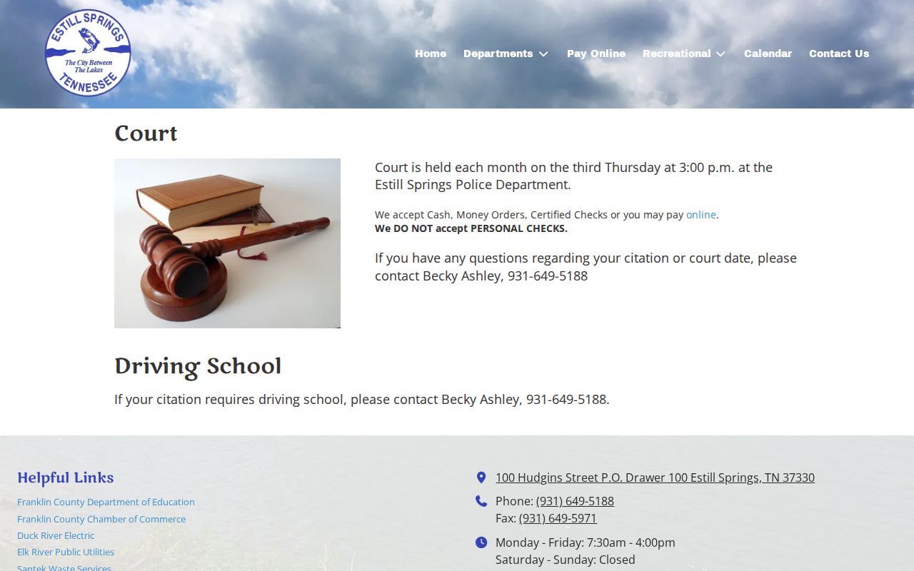 Estill Springs warrant records reader reviewing the municipal court schedule